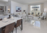 Modern conference room with smart TV at luxury apartments in Coral Gables, FL, featuring elegant decor.