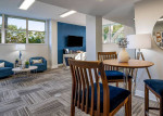 Modern apartment living area with upgraded furniture and amenities in Clearwater, FL