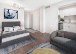 Modern studio apartment with upgraded appliances and stylish decor at Indigo Apartments, Clearwater, FL.