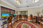 Modern computer workspace with stylish seating in community area at Park at Via Veneto apartments, Jacksonville, FL.