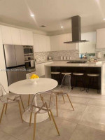 "Exquisite 5 Bed, 4 Bath Luxury Home in Modern Doral 45 Community wit