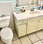 Welcome Home, hardwood flooring in two bedrooms and vinyl in one BR.
