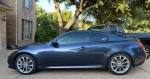 2008 Infiniti G37 Sport Coupe parked in a residential area with sleek design and clean exterior.