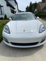 Front view of a pristine 2011 Porsche Panamera, low mileage, well-maintained, available for purchase.