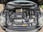 Engine compartment of a 2013 Mini Cooper S Turbo with clean condition and performance features