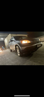 2008 Honda CR-V for sale with 122,000 miles, excellent condition, some interior water damage, and sunroof covered.