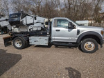 2018 Ford hook lift truck with clean exterior and storage box for sale, perfect for heavy-duty work.