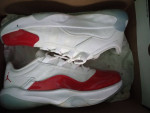 White and red Jordan low top 11s Men size 9 1/2