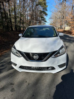2017 Nissan Sentra white sedan front view, 140,000 miles, good condition, reliable daily driver.