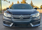 Front view of a Honda Civic 2.0L with moon roof and backup camera, available for financing.