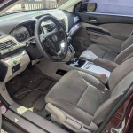 Interior view of a Honda CR-V EX with sunroof and modern dashboard design.