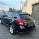 2013 Subaru Outback 2.5i in black, AWD, for sale with 65,875 miles, clean title, and financing options available.
