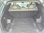 Interior view of a 2015 Hyundai Tucson GLS showing spacious and clean cargo area.