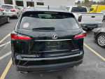 Rear view of a 2016 Lexus NX 200t F SPORT parked, showcasing the sleek design and modern features.