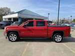 2014 GMC Sierra 1500 SLE in Fire Red with 134,287 miles, featuring alloy wheels and navigation system.
