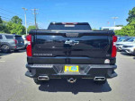 Rear view of a black 2022 Chevrolet Silverado 1500 Limited Custom Trail Boss with 71,643 miles