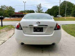 2008 Nissan Altima 2.5 sedan with leather seats, low mileage and clean title, priced at $2800, ready to drive.