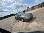 2003 Chevrolet Monte Carlo LS coupe with 185,437 miles, V6 engine, and clean title, ideal daily driver.