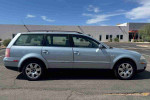 2003 Volkswagen Passat GLX wagon in silver with 58,800 miles, featuring 16-inch wheels and a power sunroof
