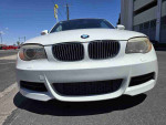 Front view of a 2013 BMW 1 Series 128i, showcasing its iconic design and sporty features.