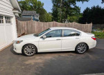 Side view of a 2013 Honda Accord Sport in white, showcasing its sleek design and low mileage of 52,000.