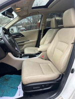 Interior view of a 2015 Honda Accord EX with beige leather seats and sunroof, showcasing comfort and style.