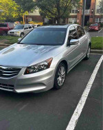 2012 Honda Accord EX-L V-6 in silver with 90,000 miles, available for $2,000.