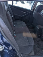 Interior view of 2012 Nissan Altima 2.5, clean backseat with no stains, well-maintained.