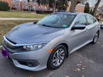 2016 Honda Civic EX FWD in silver, original owner, 104,000 miles, excellent condition, features side view camera and CarPlay.