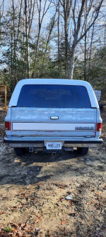 1990 Chevrolet Blazer with rear view, showcasing freshly rebuilt components and new parts ready for use.