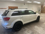 2014 Dodge Journey R/T AWD in Pearl White with black wheels showcasing its sleek design and spacious interior.
