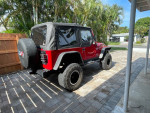 2006 Jeep Wrangler Sport 4WD parked in excellent condition with modifications and new features