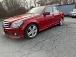 2010 Mercedes-Benz C300 Sport 4Matic in red, showcasing sleek design and excellent condition with only 47K miles.
