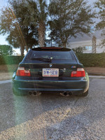 Rear view of a 1999 BMW Z3 M Coupe in Boston Green with premium features and modifications.