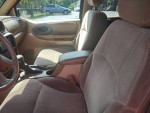 Interior of a 2003 Chevy Trailblazer 4x4 showing clean cloth seating and spacious layout for eight passengers
