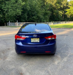 2011 Hyundai Elantra GLS FWD in blue, showcasing its well-maintained exterior and clean title.