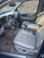 Interior view of a 2006 Chevrolet TrailBlazer LT with leather seats and dashboard details