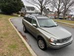 2008 Volvo XC90 with 111,000 miles for sale, showing exterior dings and recent rear damage.