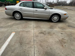 Side view of a 2004 Buick LeSabre Custom in excellent condition with low mileage.
