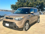 2016 Kia Soul in excellent condition, showcasing clean exterior and well-maintained features by the lake