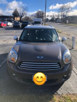 Front view of a well-maintained 2012 Mini Cooper Countryman for sale, showing its features and mileage.
