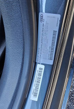 2013 Audi A7 Premium Plus quattro AWD interior detail with VIN and specifications label