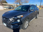 2017 Hyundai Tucson Value FWD SUV with 66,000 miles, good running condition, scratches on the body.