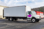 2009 Freightliner M2 26' box truck with liftgate, low mileage, suitable for commercial use.