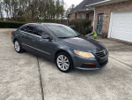 2012 Volkswagen CC R-Line with a clean title, leather seats and alloy wheels, parked in driveway.