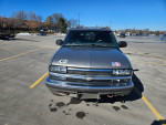 1999 Chevrolet Blazer parked, showing front view with LED headlights and stickers, for sale in Ottawa, KS.
