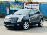 2015 Cadillac SRX Premium FWD with low mileage, featuring a sleek design and luxury interior elements.