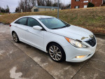 2011 Hyundai Sonata in white, featuring automatic transmission, 2.0L turbo engine, and modern design.