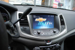 Interior view of a 2014 Chevrolet Caprice showing MyLink infotainment system and control panel