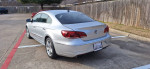 Silver 2013 Volkswagen CC Sport parked, showcasing sleek design and great condition, 62,000 miles.